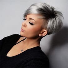 a woman with short silver hair