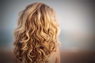 long blonde curly hair